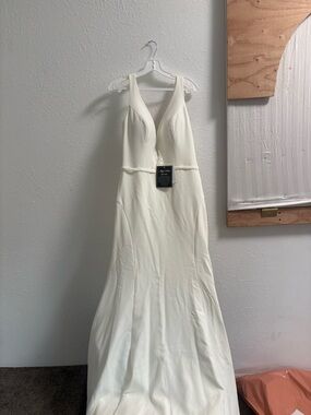 Maggie Sottero ivory wedding gown, size 14, new with tags.